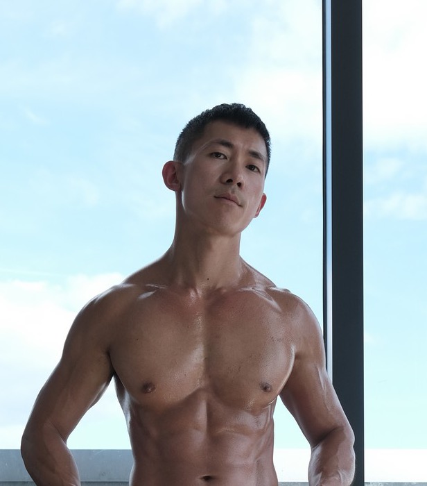 itsrawrenzo standing by a window in daylight